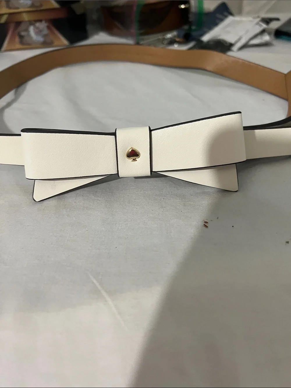 kate spade cream bow belt with gold spade detail